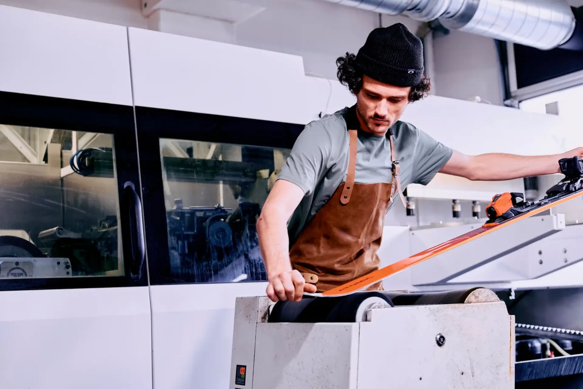 Employee sharpening a ski