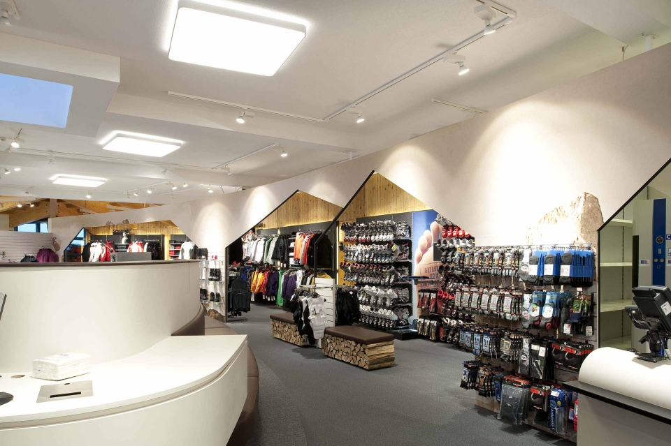 INTERSPORT Wolfart store interior with shelves and sports equipment